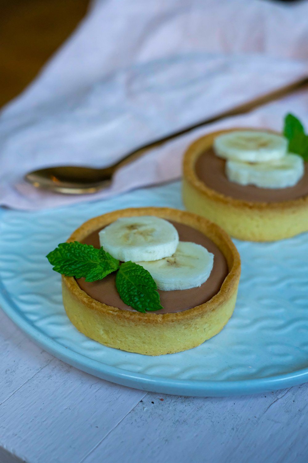 Canapékes met chocolade panna cotta en banaan